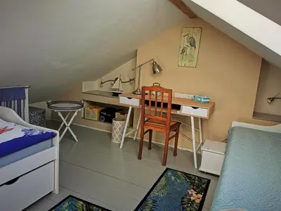 Ein Bett oder Betten in einem Zimmer der Unterkunft HR Cottage am Honigbach