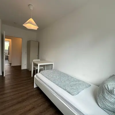 Ein Bett oder Betten in einem Zimmer der Unterkunft WDI - Workers Apartments