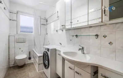 Ein Badezimmer in der Unterkunft BEGE APARTMENTS FlexiStay