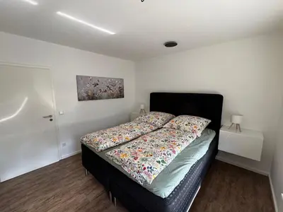 Ein Bett oder Betten in einem Zimmer der Unterkunft Nachtigall