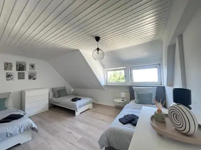 Ein Bett oder Betten in einem Zimmer der Unterkunft Socha Apartments Zuhause auf Zeit, Monteurwohnungen in Remscheid