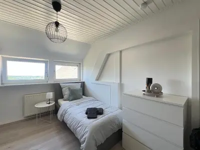 Ein Bett oder Betten in einem Zimmer der Unterkunft Socha Apartments Zuhause auf Zeit, Monteurwohnungen in Remscheid