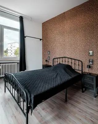 Ein Bett oder Betten in einem Zimmer der Unterkunft Rock City Apartments Room 5150