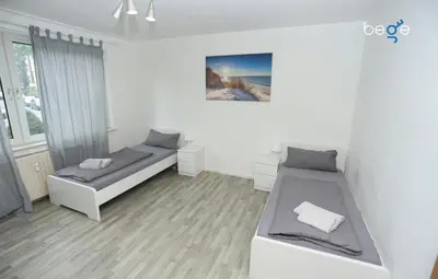 Ein Bett oder Betten in einem Zimmer der Unterkunft BEGE APARTMENTS NomaStay