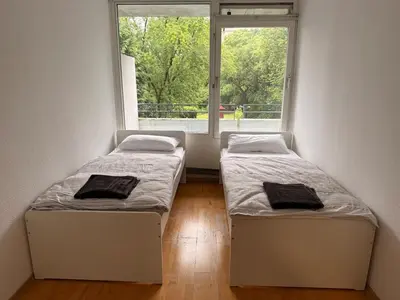 Ein Bett oder Betten in einem Zimmer der Unterkunft Monteurwohnung 6P 2 bathrooms kitchen