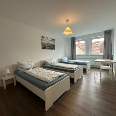 Ein Bett oder Betten in einem Zimmer der Unterkunft WDI - Workers Apartments 2