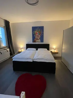 Ein Bett oder Betten in einem Zimmer der Unterkunft Sweet Home Premium Appartement 3