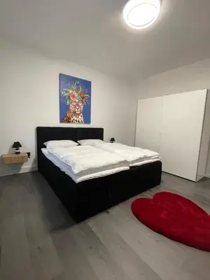 Ein Bett oder Betten in einem Zimmer der Unterkunft Sweet Home Premium Appartement 3