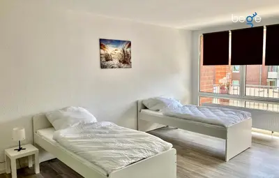 Ein Bett oder Betten in einem Zimmer der Unterkunft BEGE APARTMENTS FlexiFlat