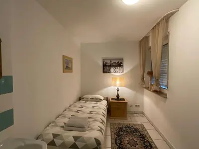 Ein Bett oder Betten in einem Zimmer der Unterkunft Citynahe Komfortwohnung für bis 6 Personen