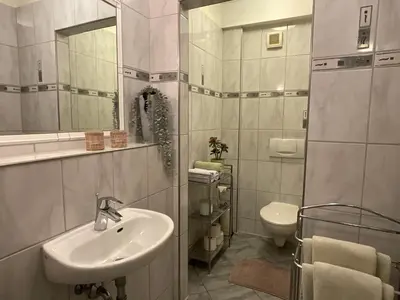 Ein Badezimmer in der Unterkunft Citynahe Komfortwohnung für bis 6 Personen