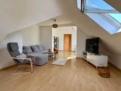 Ein Sitzbereich in der Unterkunft Ruhige, zentrale Lage - Modernes Apartment