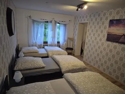 Ein Bett oder Betten in einem Zimmer der Unterkunft Ferienwohnung