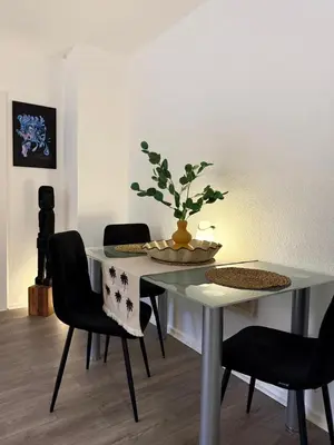 TV/Unterhaltungsangebot in der Unterkunft Rüttenscheid Design Apartment mit Balkon Office