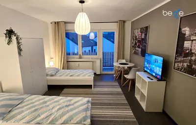 Ein Bett oder Betten in einem Zimmer der Unterkunft BEGE APARTMENTS StaySpace