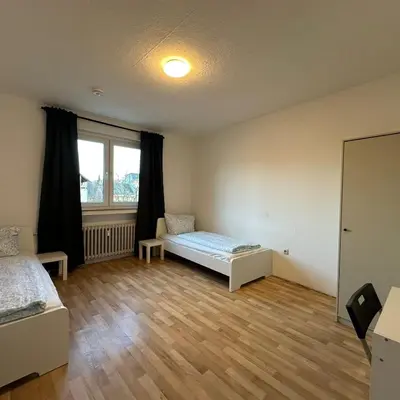 Ein Bett oder Betten in einem Zimmer der Unterkunft WDI - WorkersRooms