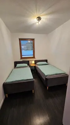 Ein Bett oder Betten in einem Zimmer der Unterkunft Quartier Levi