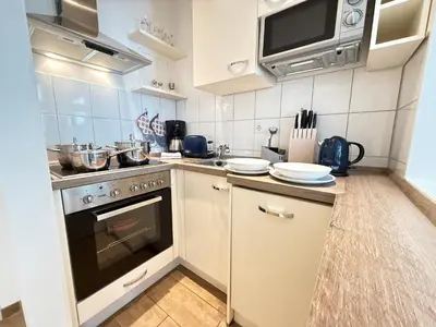 Küche/Küchenzeile in der Unterkunft Altbau trifft auf Moderne - neuwertige Komfortwohnung für bis 2 Personen
