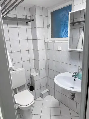 Ein Badezimmer in der Unterkunft Apartment with kitchen, bed, sofa