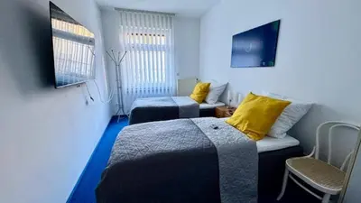 Ein Bett oder Betten in einem Zimmer der Unterkunft Charming Apartment in historischer Polizeiwache