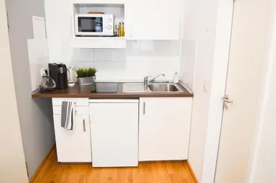 Küche/Küchenzeile in der Unterkunft Centerapartments Tonhallenstraße