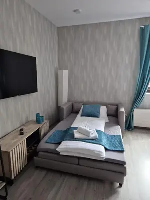 Ein Bett oder Betten in einem Zimmer der Unterkunft Studio Apartment