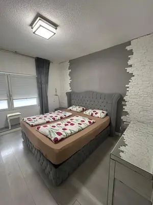 Ein Bett oder Betten in einem Zimmer der Unterkunft Ferienwohnung Gladbeck