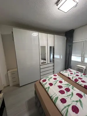 Ein Bett oder Betten in einem Zimmer der Unterkunft Ferienwohnung Gladbeck
