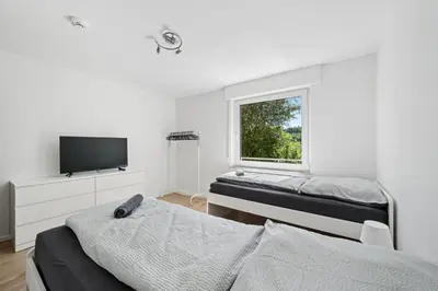 Ein Bett oder Betten in einem Zimmer der Unterkunft Lüdenscheid Stay- Moderne Monteurzimmer