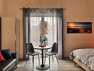 Ein Bett oder Betten in einem Zimmer der Unterkunft Neues Ruhrtal Apartment 2 mit Balkon