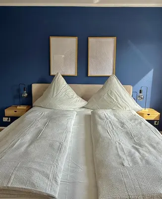 Ein Bett oder Betten in einem Zimmer der Unterkunft Neu renoviertes Apartment mit 2 Schlafzimmern, Küche & Waschtrockner - 900 m Zentrum Borken