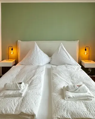 Ein Bett oder Betten in einem Zimmer der Unterkunft Neu renoviertes Apartment mit 2 Schlafzimmern, Küche & Waschtrockner nahe Zentrum Borken