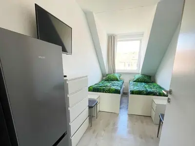 Ein Bett oder Betten in einem Zimmer der Unterkunft Modern Central Apartment in Duisburg