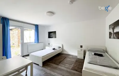 Ein Bett oder Betten in einem Zimmer der Unterkunft BEGE APARTMENTS PrimeWork