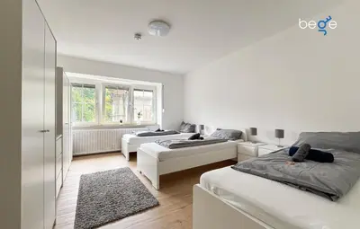 Ein Bett oder Betten in einem Zimmer der Unterkunft BEGE APARTMENTS UrbanWork