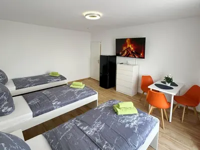 Ein Bett oder Betten in einem Zimmer der Unterkunft Bright Modern Apartments in Mülheim an der Ruhr