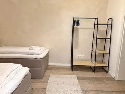 Ein Bett oder Betten in einem Zimmer der Unterkunft Loft I 3 Min bis Hbf I Netflix I Boxspring Betten