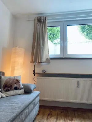 Ein Bett oder Betten in einem Zimmer der Unterkunft Helles, gepflegtes Souterrain Apartment in ruhiger Lage