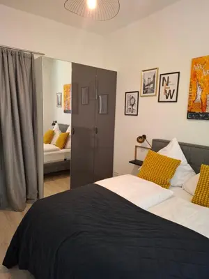 Ein Bett oder Betten in einem Zimmer der Unterkunft Urban-Chic-Zentral-Bahnhof-Altstadt-W2