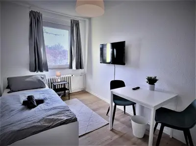 Ein Bett oder Betten in einem Zimmer der Unterkunft Work Inn Rhein Ruhr Appartement