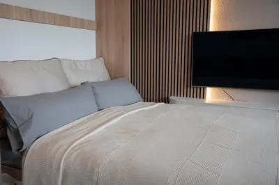 Ein Bett oder Betten in einem Zimmer der Unterkunft TANIC Central Loft Main Station
