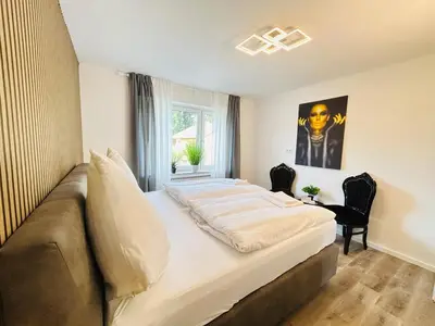 Ein Bett oder Betten in einem Zimmer der Unterkunft Fewo am Tüllinghof