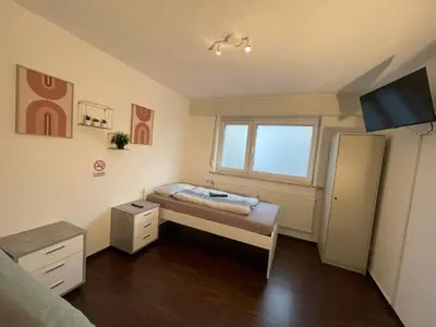 TV/Unterhaltungsangebot in der Unterkunft Moderne Monteurzimmer Vu