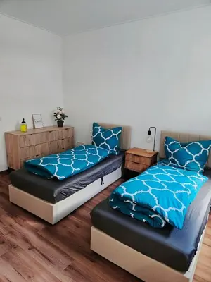 Ein Bett oder Betten in einem Zimmer der Unterkunft Schöne gemütliche Wohnung im Wasserviertel Stadtnah, A40,nähe der Uni oder Zoo