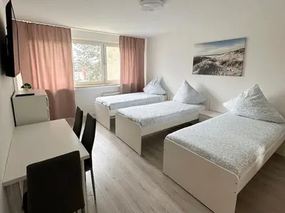 Ein Bett oder Betten in einem Zimmer der Unterkunft Beautiful apartments in Bergkamen bei Dortmund
