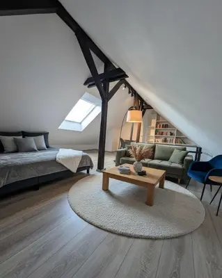 Ein Bett oder Betten in einem Zimmer der Unterkunft Traumwohnung über den Dächern Rüttenscheids