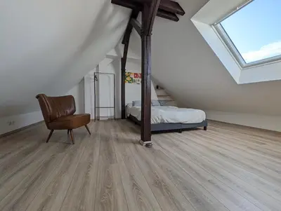 Ein Bett oder Betten in einem Zimmer der Unterkunft Traumwohnung über den Dächern Rüttenscheids