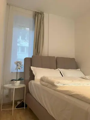 Ein Bett oder Betten in einem Zimmer der Unterkunft Gemütliche Wohnung, ruhige Lage