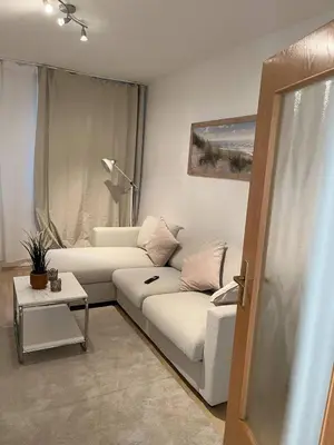 Ein Sitzbereich in der Unterkunft Gemütliche Wohnung, ruhige Lage