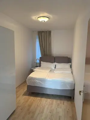 Ein Bett oder Betten in einem Zimmer der Unterkunft Gemütliche Wohnung, ruhige Lage